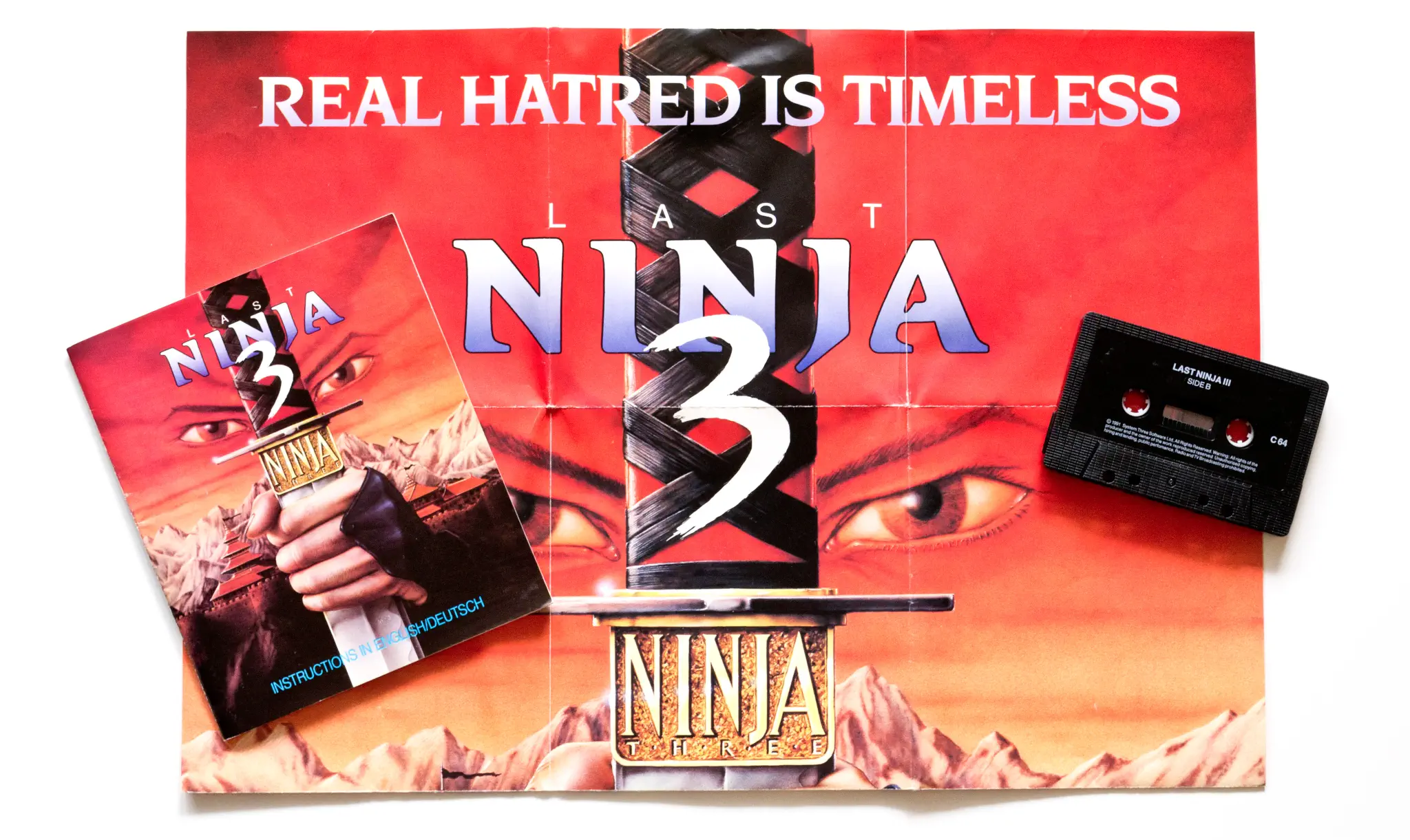 Photo of the content of The Last Ninja 3: Real Hatred is Timeless (1991, C64, EU); developed by System 3 Software Ltd., published by System 3 Software Ltd.; Hi-res 3D box available at https://bigboxcollection.com