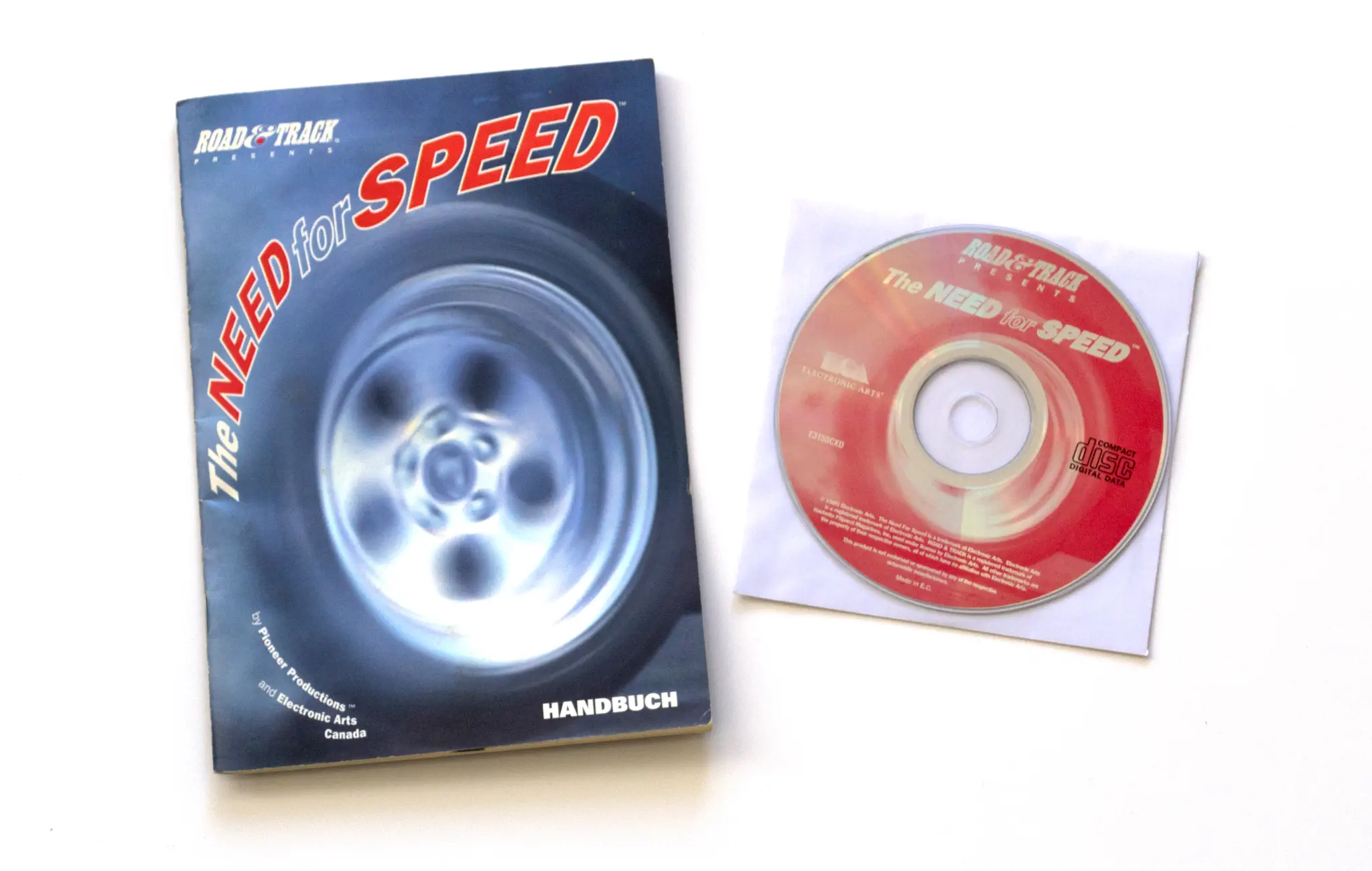 Photo of the content of The Need for Speed (1994, PC, DE); developed by Electronic Arts Canada; Pioneer Productions, published by Electronic Arts, Inc.; Hi-res 3D box available at https://bigboxcollection.com