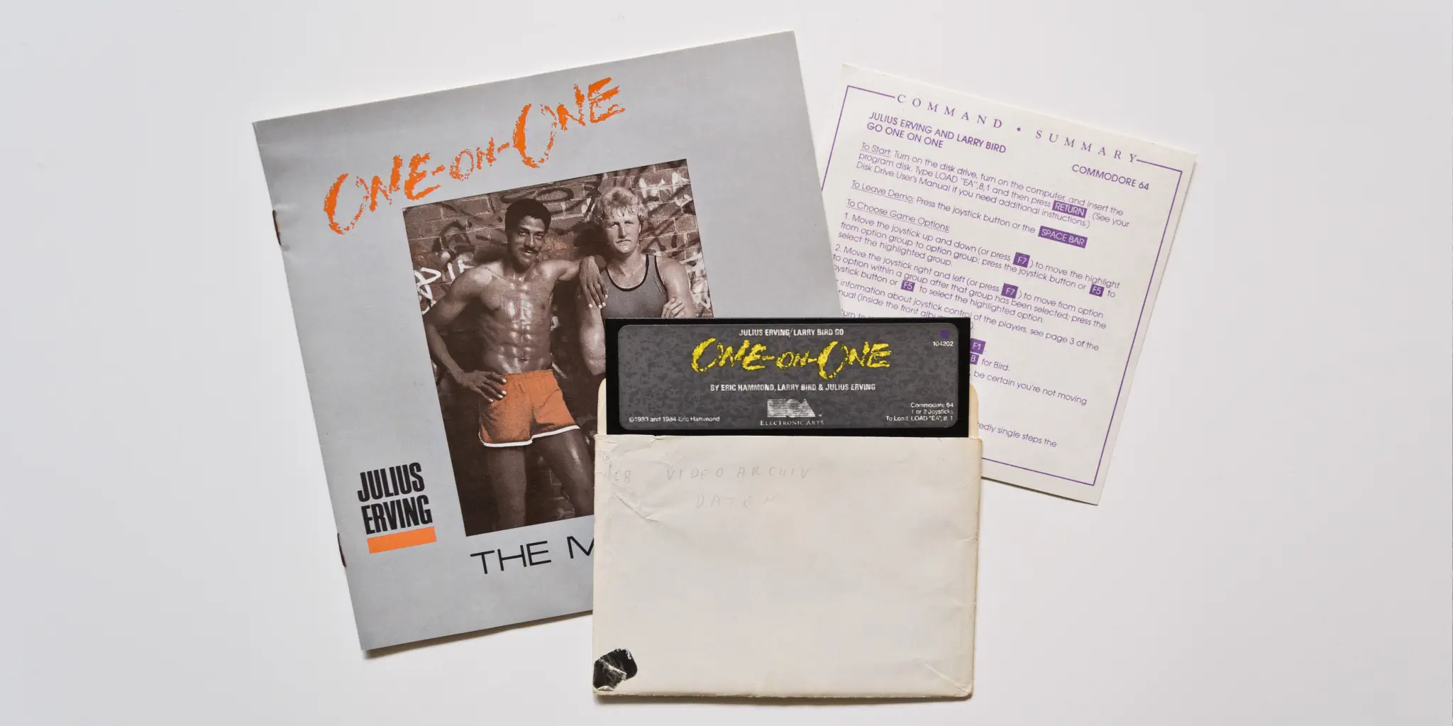 Photo of the content of One on One (1984, C64, US); developed by Eric Hammond, published by Electronic Arts, Inc.; Hi-res 3D box available at https://bigboxcollection.com