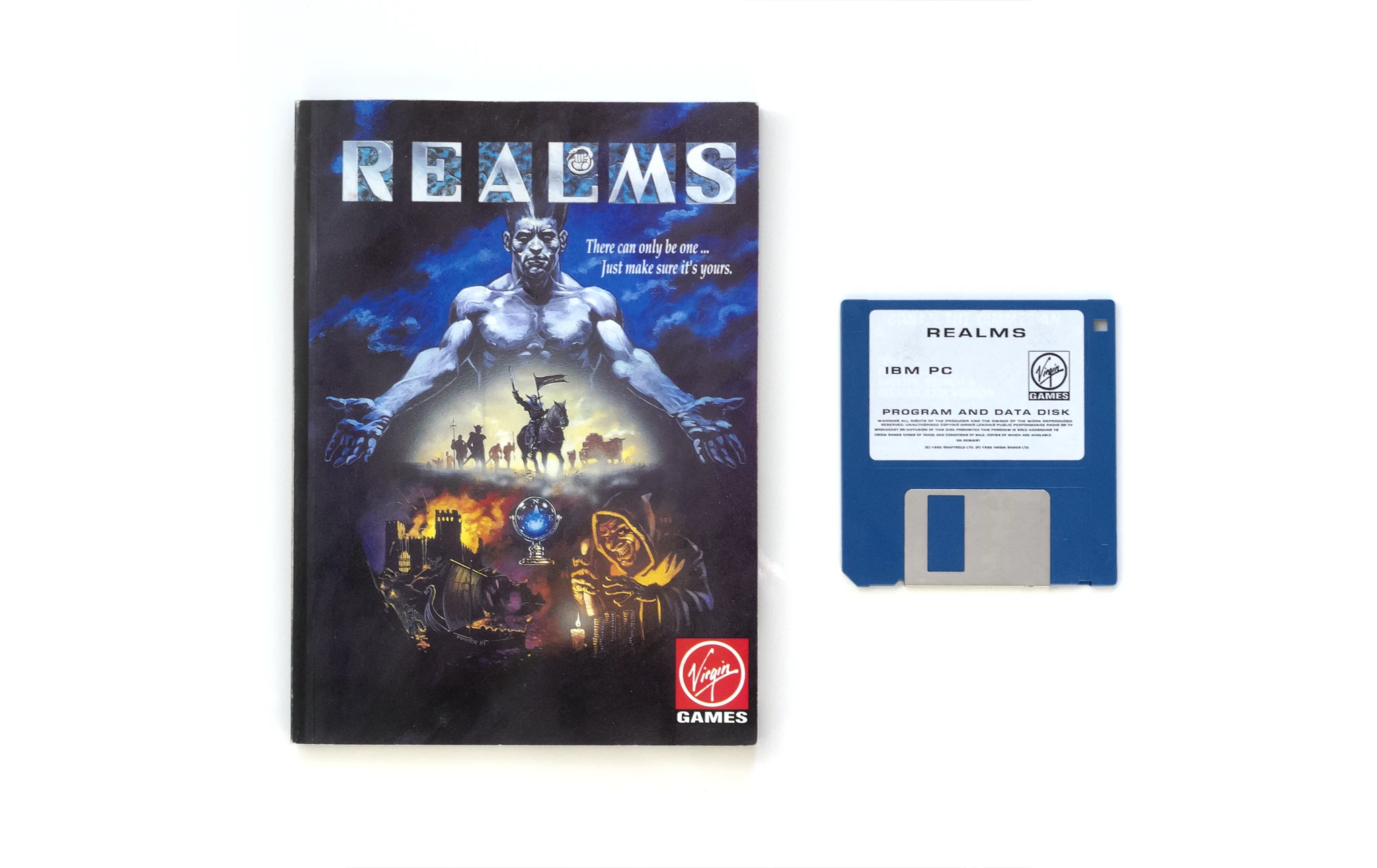 Photo of the content of Realms (1992, PC, EU) Photo of the content of Realms (1992, PC, EU); developed by Graftgold Ltd., published by Virgin Games, Inc.; Hi-res 3D box available at https://bigboxcollection.com