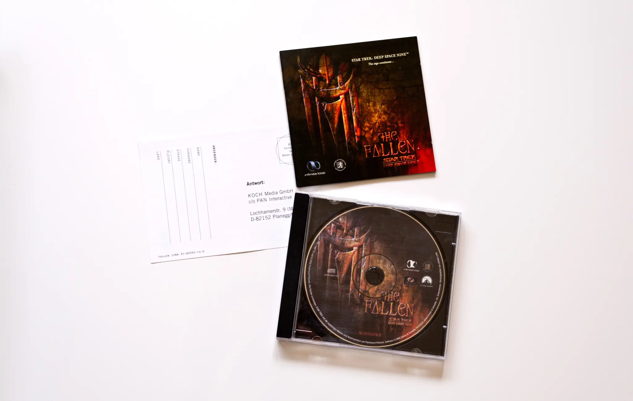 Photo of the content of Star Trek: Deep Space Nine - The Fallen (2000, PC, DE) Photo of the content of Star Trek: Deep Space Nine - The Fallen (2000, PC, DE); developed by Collective, Inc., The, published by PAN Interactive; Hi-res 3D box available at https://bigboxcollection.com