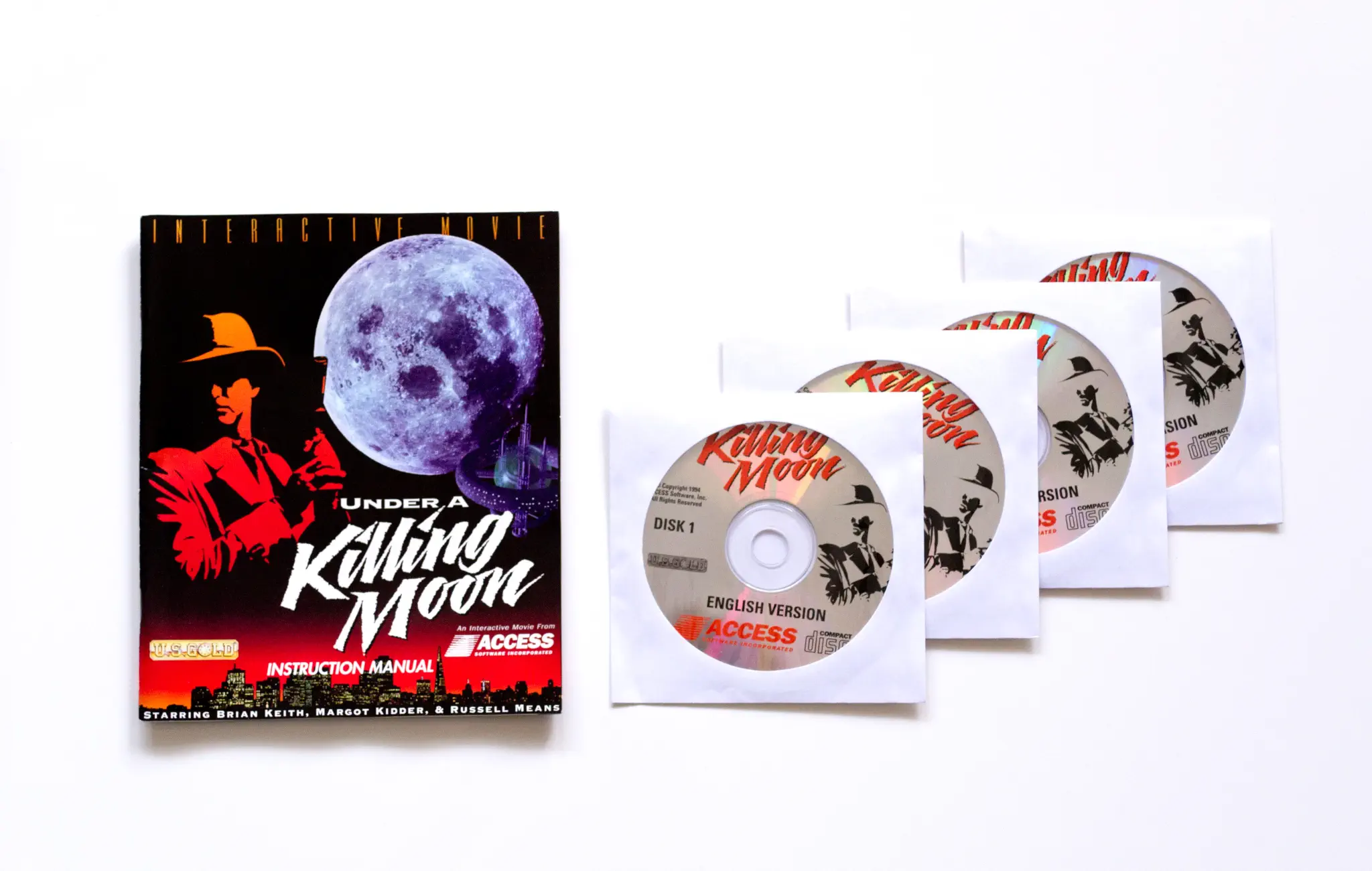 Photo of the content of Tex Murphy: Under a Killing Moon (1994, PC, EU) Photo of the content of Tex Murphy: Under a Killing Moon (1994, PC, EU); developed by Access Software, Inc., published by Access Software, Inc.; Hi-res 3D box available at https://bigboxcollection.com