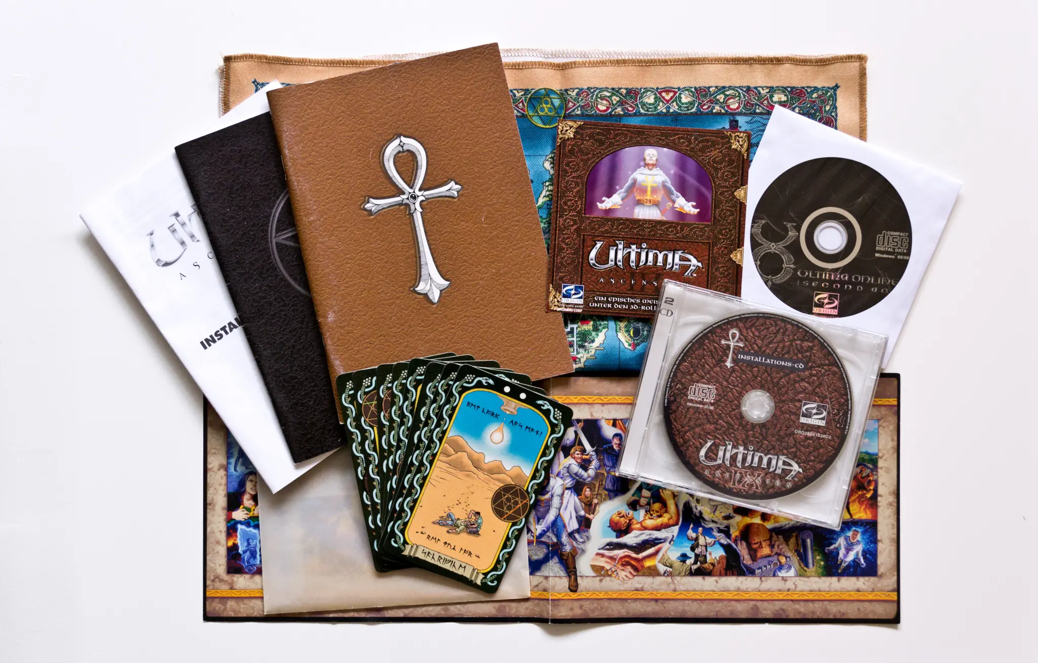 Photo of the content of Ultima IX: Ascension (1999, PC, DE); developed by ORIGIN Systems, Inc., published by Electronic Arts, Inc.; Hi-res 3D box available at https://bigboxcollection.com